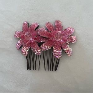 Pink hair clip with two flowers